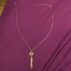 Necklace never been worn on thin gold chain